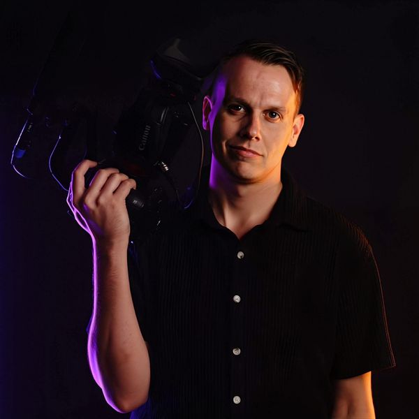Wesley Blalock, founder of Blalock Film Co., holding a Canon cinema camera